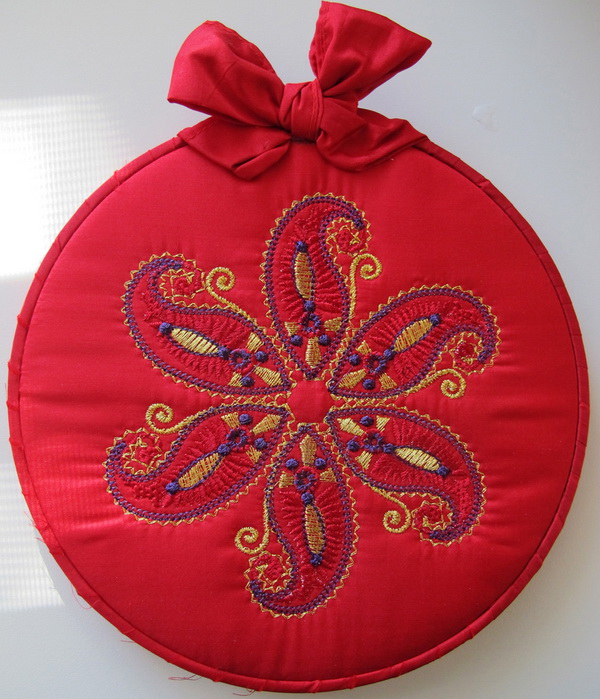 Blue Crush Machine Embroidery Designs by Stitchingart. Artistic decorative red foot stool.