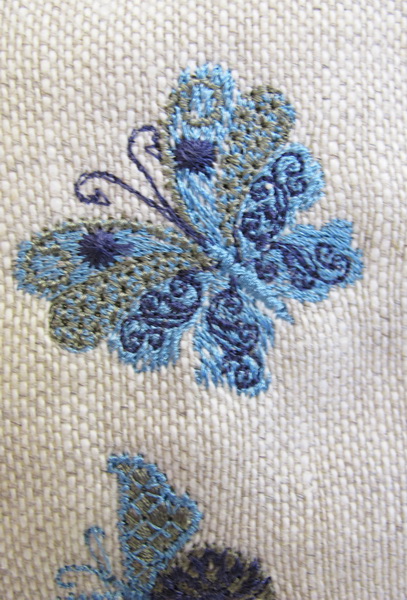 Earth Dance Machine Embroidery Designs. Butterfly, love hears, floral and flower bag. Pretty machine embroidery design.