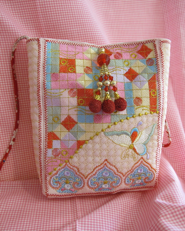 Harmony Machine Embroidery Designs by Stitchingart. Bag with artistic patterns and butterfly.