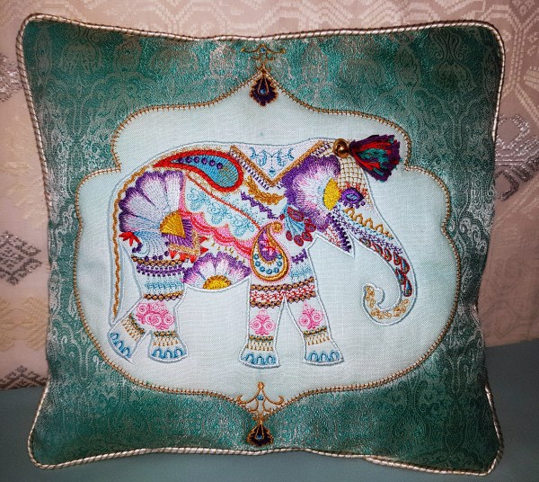 Wild and Free Machine Embroidery Designs. Elephant artistic embroidery deisgns on a pillow. Indian Elephant